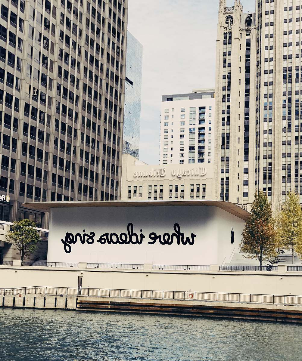 dusable bridge white concrete building near body of water michigan avenue